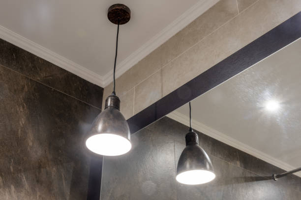 istock Loft lamp with metal shade in the bathroom with mirror 1208716266