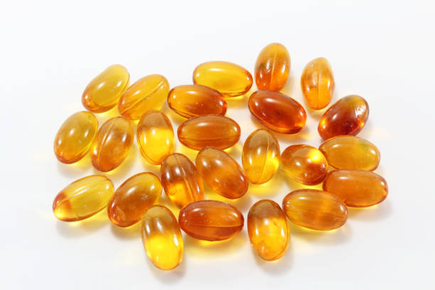 タラ肝油カプセル - fish oil vitamin pill cod liver oil nutritional supplement ストックフォトと画像