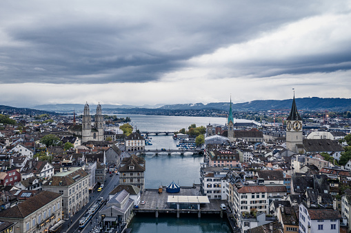 aerial view of St. Peter's Church clock tower, Fraumunster and Grossmunster by the Limmat River, Zurich old town.