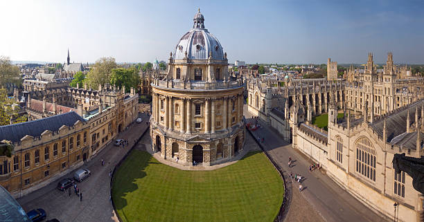 Radcliffe Camera Panorama Handheld panoramic shot of the Radcliffe Camera and surrounding University buildings in Oxford. oxford university photos stock pictures, royalty-free photos & images