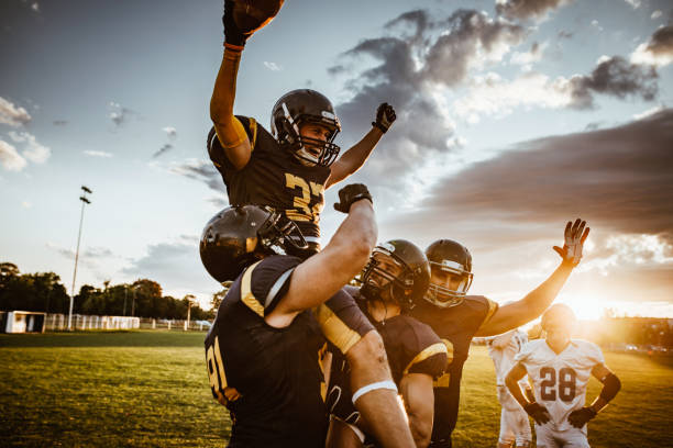 2,100+ American Football Team Stock Photos, Pictures & Royalty-Free Images  - iStock  American football team flag, American football team huddle, American  football team celebrate