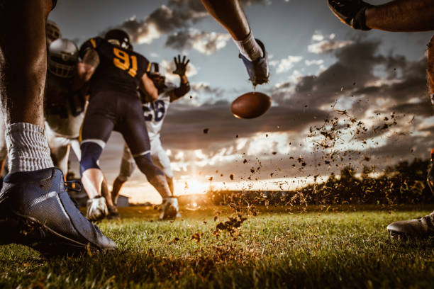 istock Kick off on American football match at sunset! 1208736150