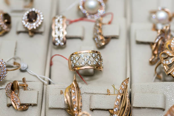 istock Jewellery with gemstones at showcase in store 1208737984
