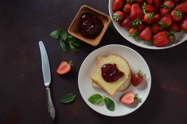 istock Toasts with strawberry jam 1208739124