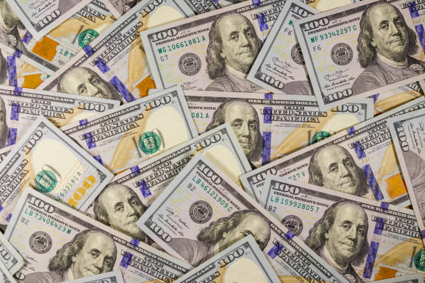 istock Background of american one hundred dollar bills 1208740108