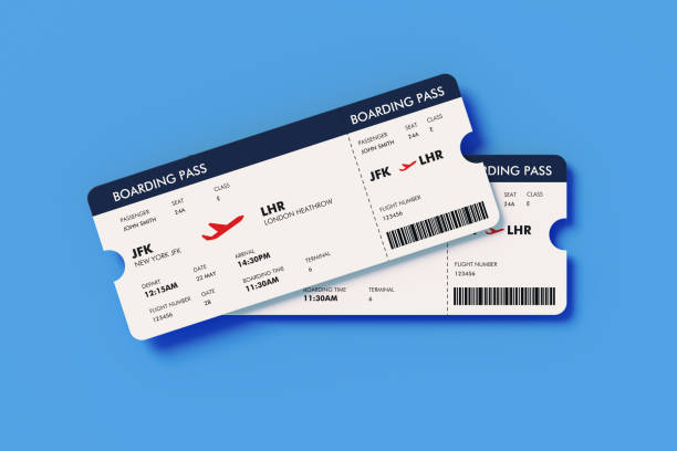 istock Royal Blue Airline Ticket Pair on Blue Background 1208740414