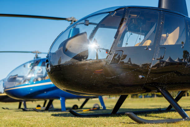istock Helicopters grounded on grass for exhibition 1208740697