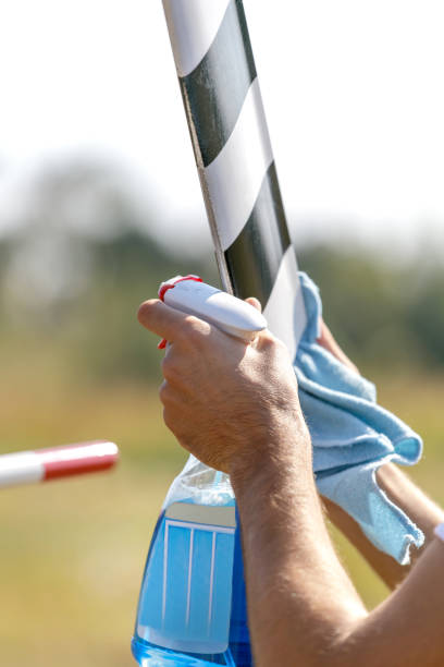 istock Wiping helicopter propellers with cleaning agent and cloth 1208740705
