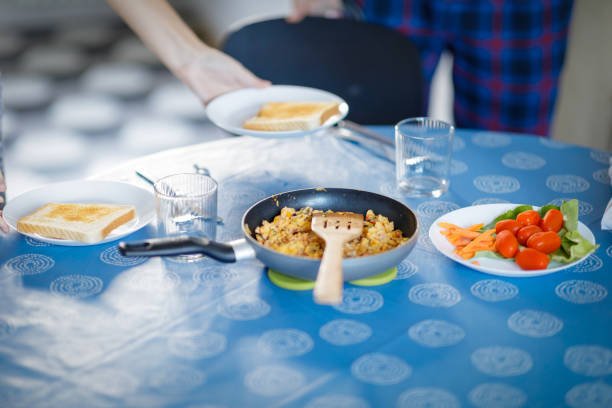 istock Serving toasted bread with scrambled eggs and salad 1208743243