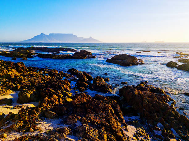 istock Looking across rocks towards South Africa's landmark Table Mountain 1208744909