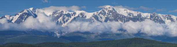 Free Stock Photo of A mountain range with clouds in the background ...