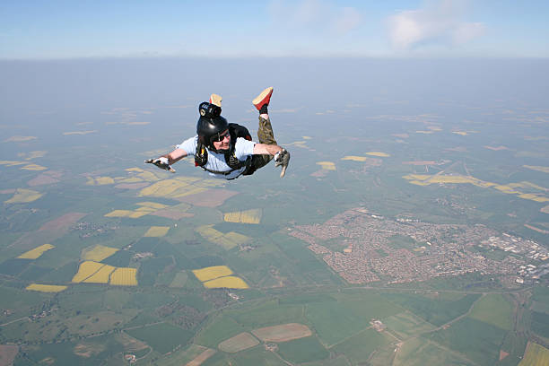 istock Skydiver looks at his altimeter 120874549