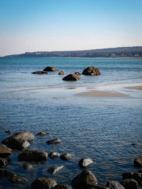 istock Rocks on beach at low tide backgrounds 1208746244