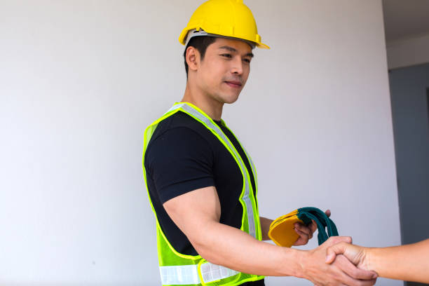 istock Engineers or architects are inspecting the quality of construction and materials in the construction of the house or building. 1208746519