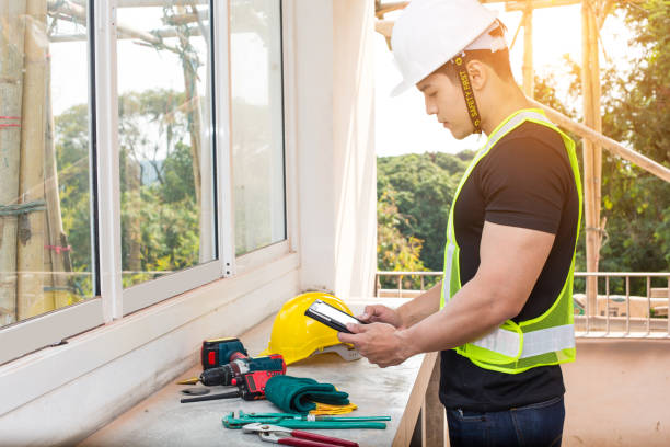 istock Engineers or architects are inspecting the quality of construction and materials in the construction of the house or building. 1208746522
