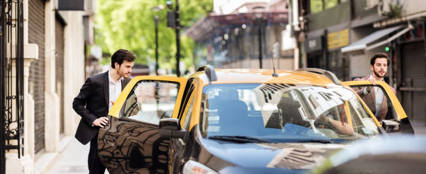 istock Catching up a taxi 1208746716