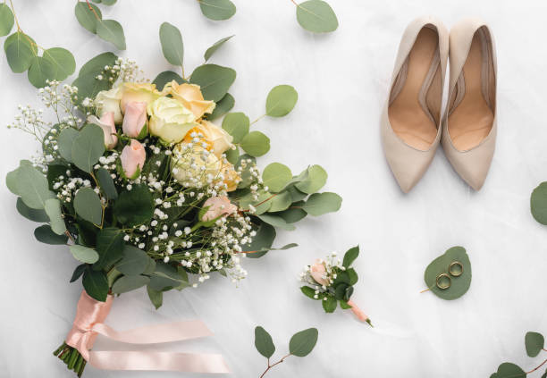 istock Wedding accessories in bride and groom room on white 1208749488