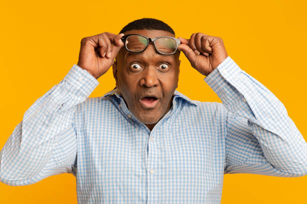 istock Shocked mature african american man looking at camera 1208751629