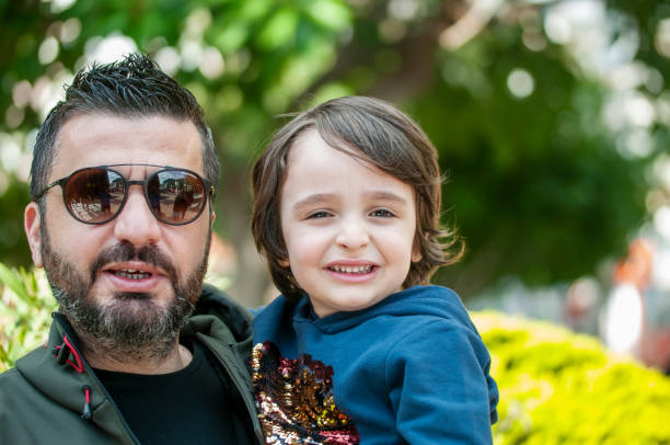 istock Turkish happy father and his son hugging 1208756220