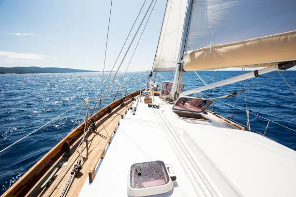 Photo of yacht bow in Mediterranean sea in the middle of the sunny summer day