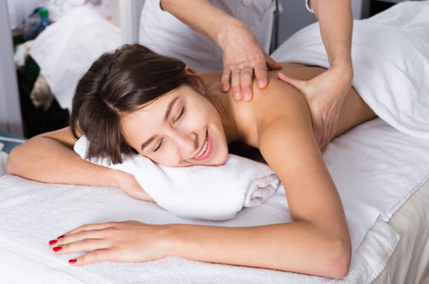 istock Young woman having massage 1208759825