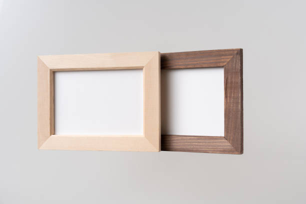 istock top view of two brown wood photo frame on white 1208761478