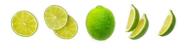 istock Set of fresh whole and slices lime. Isolated on white background. Top view 1208762817