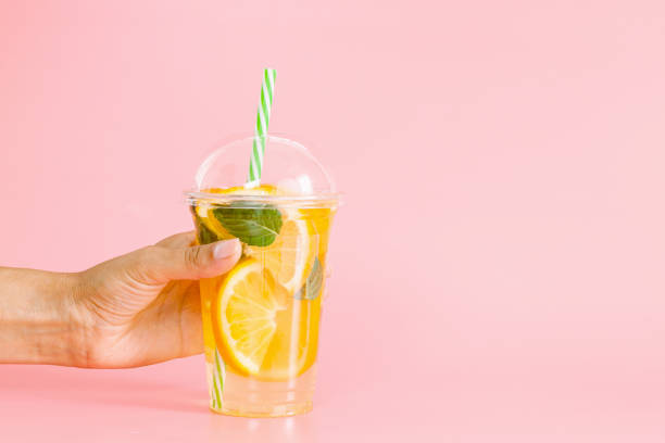 istock Glass of fresh orange juice with mint. Top view 1208763009