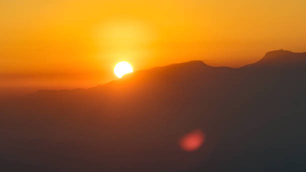 istock Sun setting over the mountains. Sunset or sunrise at mountains 1208763374
