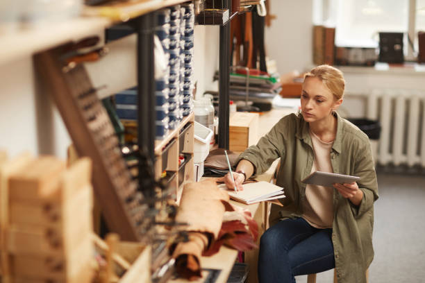 Serious Young Woman In Workshop