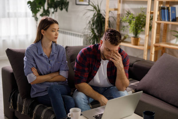 istock Young couple having an argument at home 1208769288