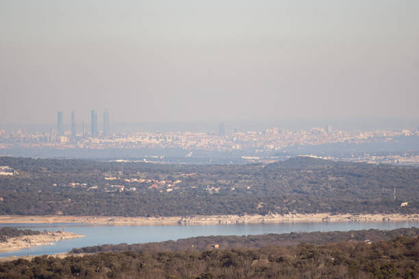 istock Panoramic view of Madrid (Spain) and pollution cloud from the distance 1208772017