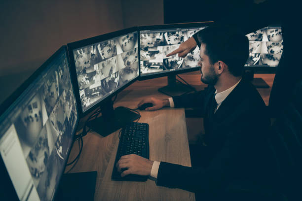 istock Profile side view of his he qualified safeguard private property expert supervising panel using cyber technology night shift boss showing violation breaking law at workplace workstation 1208772494