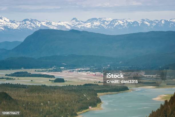 Aerial View Of Snow Capped Mountain Range Surrounding Juneau Ak Stock Photo - Download Image Now