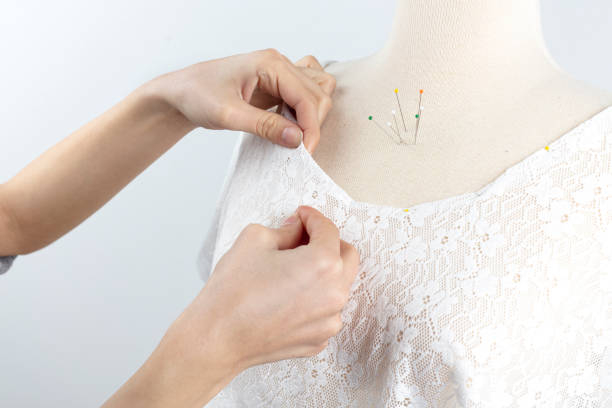 istock tailor's dummy, rehearsal dummy, working and measuring hands. 1208781670