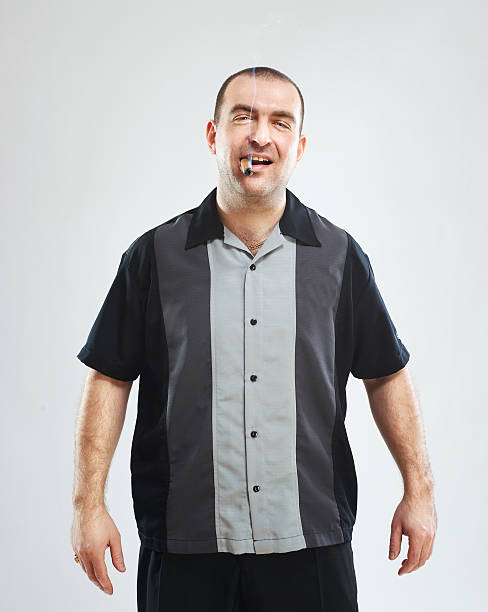 Portrait of serious smoking tough guy stock photo