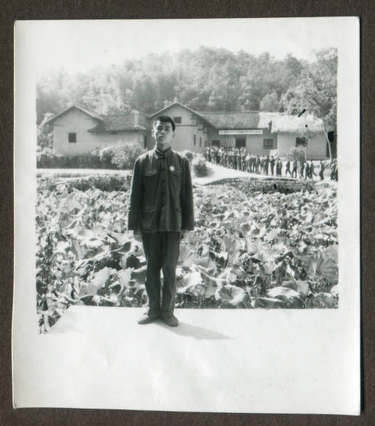 1970s China young men portrait monochrome old photo 1970s China young men portrait monochrome old photo, Visit the Hometown of Mao Zedong, Shaoshan, Hunan. men close up 20s asian ethnicity stock pictures, royalty-free photos & images