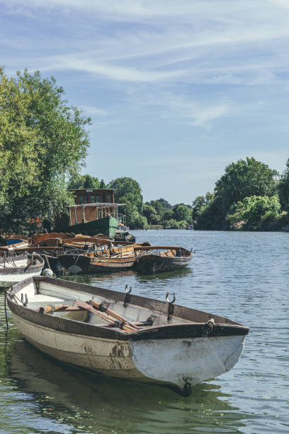 istock Wooden rowboats at the River Thames 1208782309