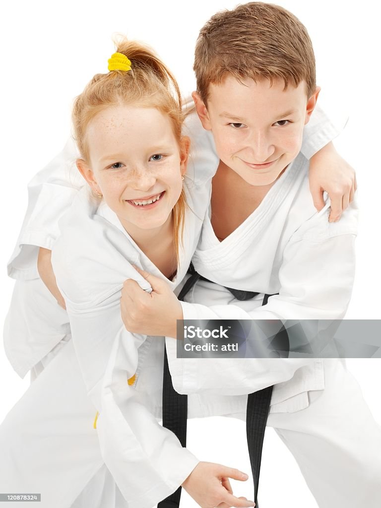 Karate niño y niña - Foto de stock de Artes marciales libre de derechos