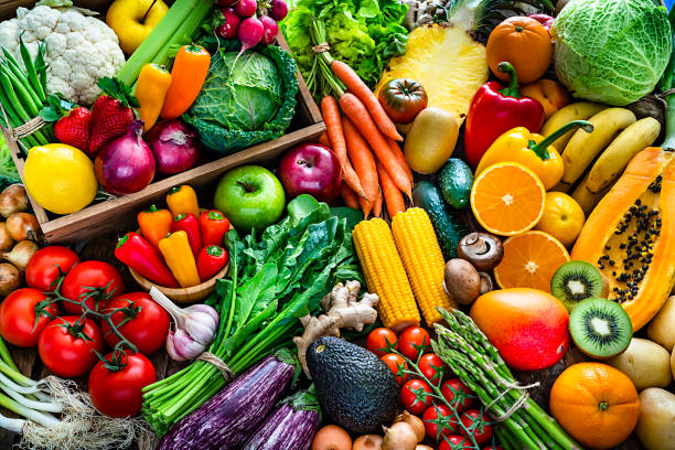 istock Healthy fresh fruits and vegetables background 1208790368