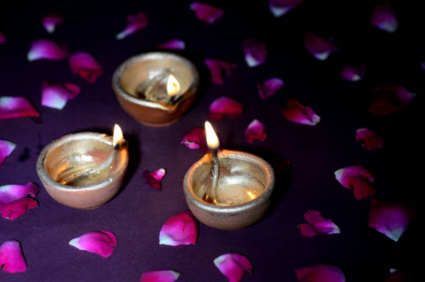 istock Traditional clay diya lamps lit during Diwali celebration 1208793864