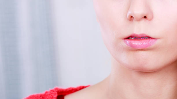 istock Portrait of woman with serious face expression 1208794240