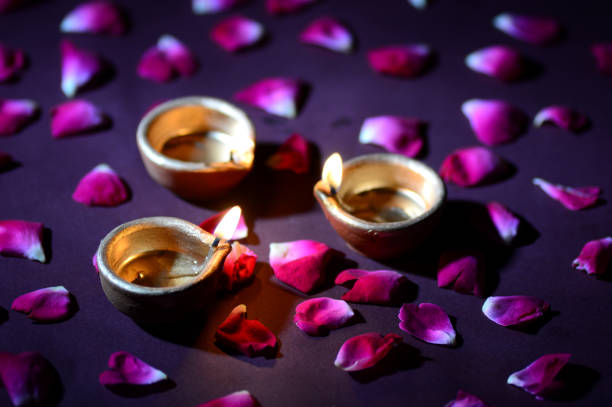 istock Traditional clay diya lamps lit during Diwali celebration 1208794261