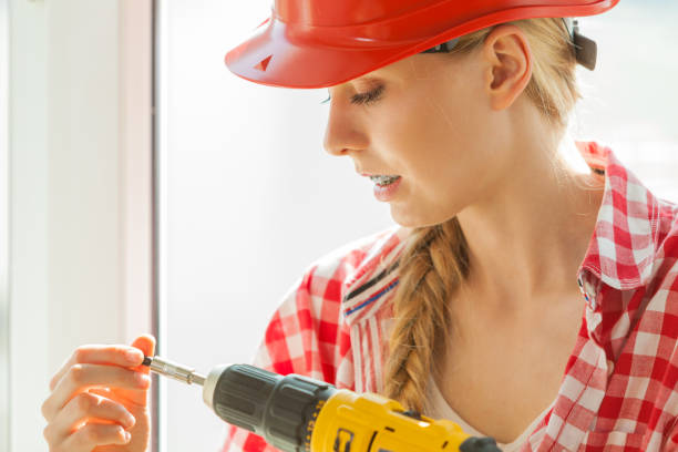 istock Young woman adjusting her drill 1208795121
