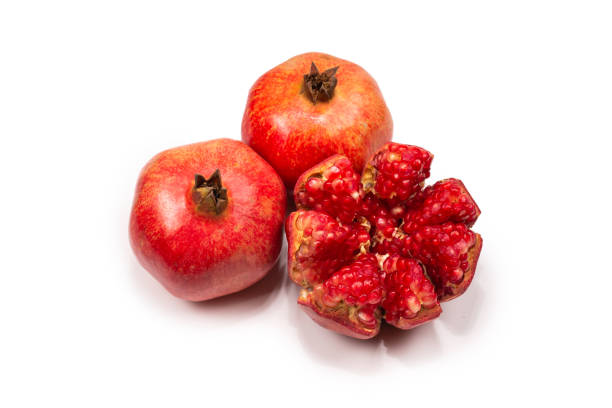 istock Sweet pomegranate isolated on white background. 1208795129