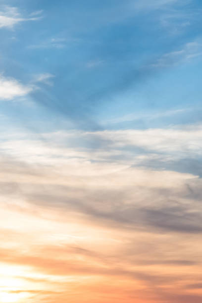 istock Vertical ratio size of sunset background. sky with soft and blur pastel colored clouds. gradient cloud on the beach resort. nature. sunrise.  peaceful morning. Instagram toned style 1208798252