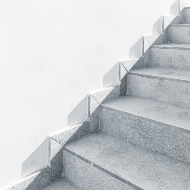 istock Empty stone stairway and white wall, abstract photo 1208800227