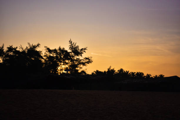 istock a beautiful yellowish sunset in goa beach 1208803652