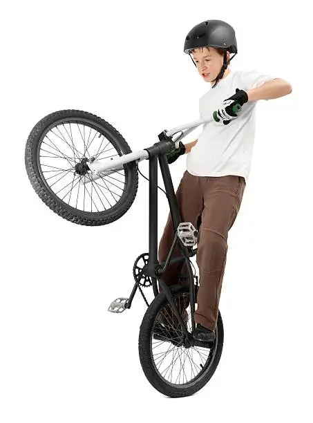 Young Boy making Tricks on Bike