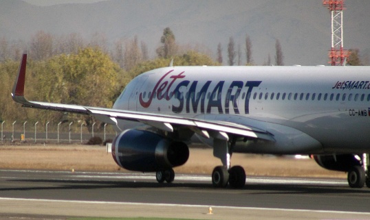 Looking At Jet Smart Airlines Passenger Airplane Taxiing To Loading, Unloading Gate Of Arturo Merino Benitez International Airport After Arrival In Santiago Chile South America